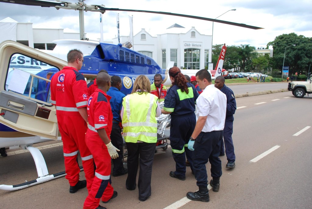 Paramedics in front of air ambulance